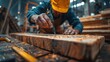 © svastix - A focused image of a skilled carpenter working intently with wood, using a power tool in a workshop, highlighting precision and craftsmanship in woodworking and carpentry.
