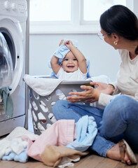 Sticker - Laundry, mom and baby in basket with fun, bonding and child development with happy toddler in home. Housekeeping, mother and infant girl playing together with clothes, washing machine and cleaning