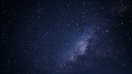 Wall Mural - a captivating starry night sky with vibrant stars, illuminating the darkness and evoking wonder.