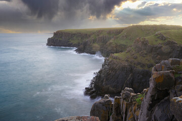 Dramatic cliffs and stormy ocean 