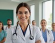 © Luis Eduardo - Woman in a Hospital Setting with a Stethoscope Around her Neck Smiling.