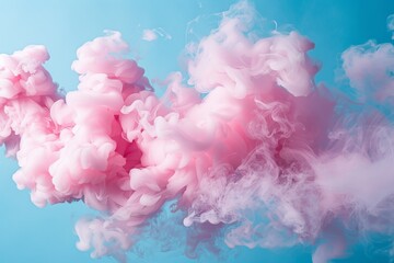 Poster - Pink smoke billows across a blue studio backdrop in a high-angle photograph