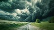 © Thirawat - Black clouds roll in over a quiet countryside road, the serene landscape suddenly feeling ominous.