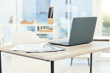 Poster - Laptop, office and finance documents on desk for company budget plan with review for startup business. Computer, research and paperwork with investment, profit or revenue report in empty workplace.