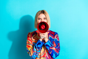 Sticker - Photo of bossy angry gloomy girl with bob hairstyle dressed print shirt scream in megaphone on protest isolated on blue color background