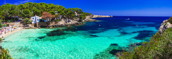 Canvas Print - Best scenic beaches of Mallorca (Majorca) Balearic island - beautiful Cala Gat with amazing turquoise crystal sea . Spain summer holidyas