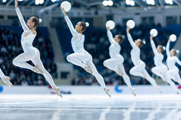 Rhythmic gymnastics team with ball, sports, performance