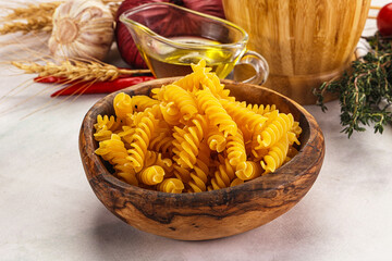 Wall Mural - Italian dry pasta Fussili for bowl