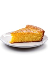 Wall Mural - A slice of cake placed on a clean white plate, ready for serving or decorating