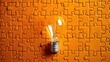 © Emin - Creative collaboration Glowing light bulb jigsaw puzzle on orange background