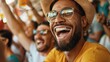 © LifeMedia - A joyful fan wearing a straw hat, celebrating passionately at a sports event, surrounded by other equally enthusiastic fans, capturing the vibrant and energetic atmosphere.
