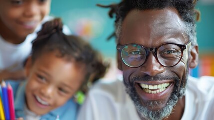 A cheerful scene of a man wearing glasses, happily smiling with two children who are holding colorful pencils, symbolizing education, joy, and connection.