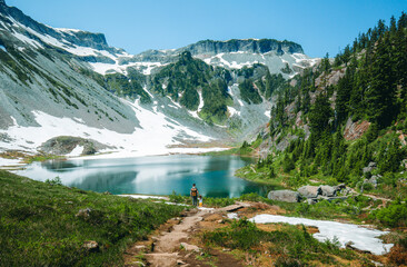 Sticker - Family travel concept. Man with a kid are standing on the trail in Artist point hiking area, scenic view in Mt. Baker Snoqualmie National Forest Park, Washington, USA.