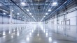 © kitipol - An empty, well-lit warehouse featuring clean floors and high-tech infrastructure. The clear lighting emphasizes the spacious and organized environment.