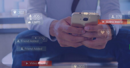 Poster - Image of social media icons falling against mid section of businessman using smartphone
