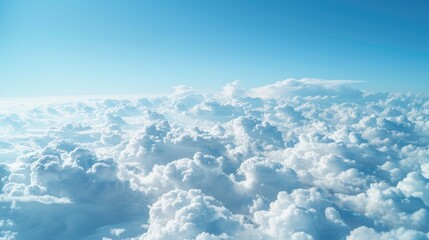 Wall Mural - View of white clouds in blue sky from aircraft