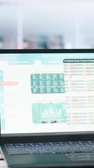 Poster - Vertical video Stock portfolio on laptop containing investment assets affected by market volatility. Empty workplace with live index indices on notebook screen showing stock demand surge, close up
