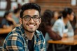 © Vorda Berge - Portrait of a smiling latino male college student in class