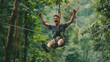 © Gita - A man excitedly ziplining through a dense forest, showcasing the thrill of outdoor adventure and nature exploration.