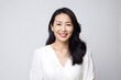 © Jati - A woman with long hair is smiling and wearing a white dress