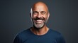 © CStock - Studio portrait of smiling man, relaxed expression,