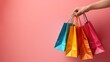 © vanzerim - Colorful Shopping Bags on a Pink Background