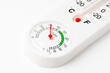 © fotofabrika - White Thermometer and Hygrometer Displaying Room Temperature and Humidity