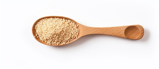 Aufkleber - A wooden spoon holding raw mixed quinoa on a white background, with copy space image available.