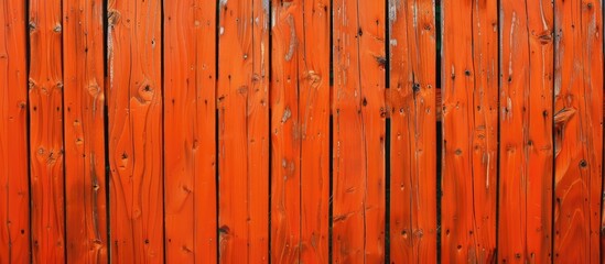 Poster - Wooden fence background with knots, painted orange, offers copy space image.