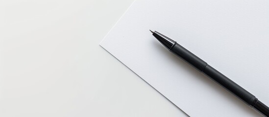 Fototapete - Top view shot of handwriting with a pen on a blank white surface, with ample copy space image available.