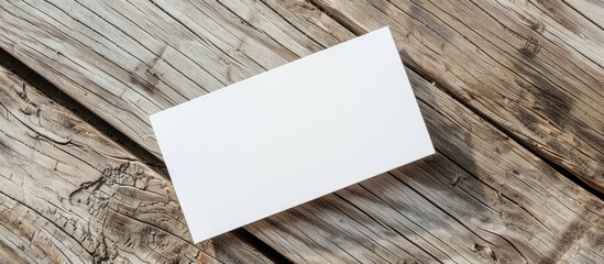 Aufkleber - Close-up shot of a white business card on a wooden backdrop with copy space image for corporate identity templates.
