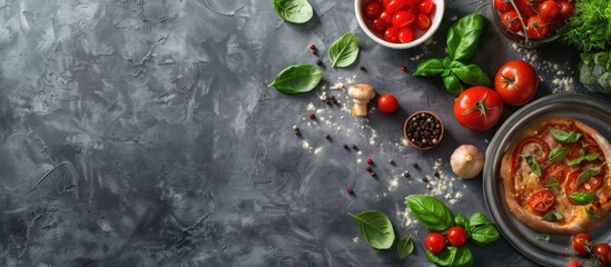 Canvas Print - Grey table flat lay with pizza crust, fresh ingredients, and space for text in the image.