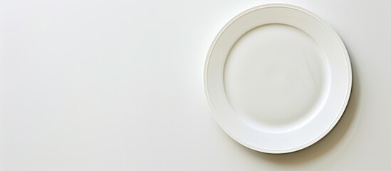 Aufkleber - Top view of an empty plate on a white background with copy space image.