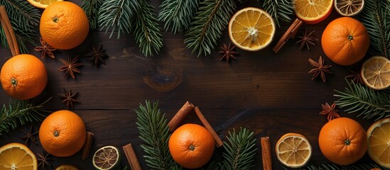 Aufkleber - Citrus fruits spices and pine branches arranged on a wooden backdrop with copy space image