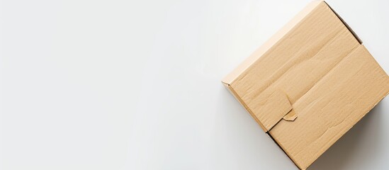 Aufkleber - Carton box parcel with a blank cap seen from a perspective angle on a white background suitable for copy space image