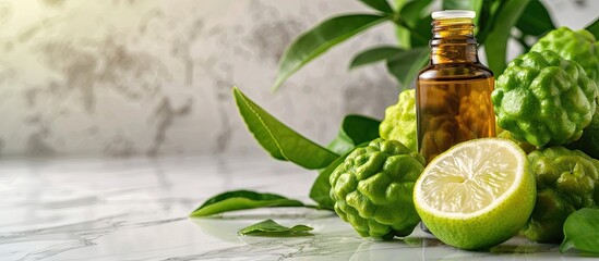 Poster - Fresh bergamot fruits and a bottle of essential oil displayed together on a white marble table with a spacious area available for adding text. with copy space image. Place for adding text or design