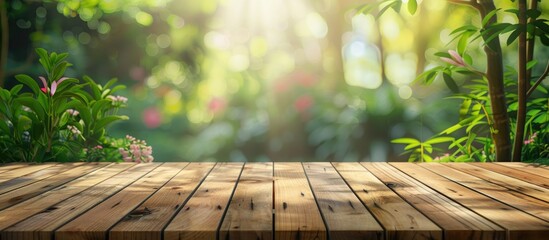 Poster - Blurry green garden background visible on wooden table by a window suitable for product display montage with copy space image
