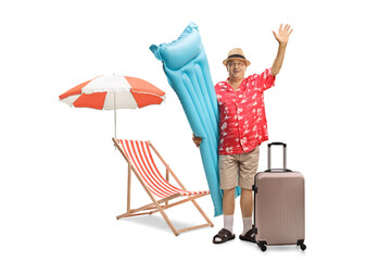 Canvas Print - Elderly tourist with an air mattress and a suitcase waving at the camera