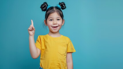 Wall Mural - The cute girl pointing.