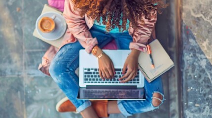 Poster - Taking in iced coffee and a laptop, a woman works on a laptop.