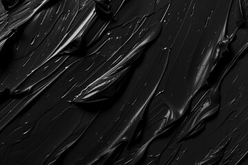 Poster - Close-up shot of black paint on a dark background, ideal for abstract or minimalist designs