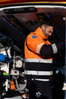 © Martin - Paramedic working inside the ambulance.