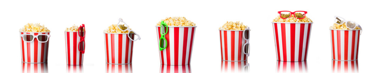 Wall Mural - Paper striped bucket with popcorn and 3D glasses isolated on white background