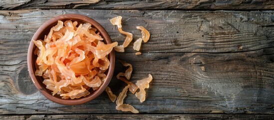 Poster - Food concept featuring dried shrimps on a wooden backdrop with copy space image