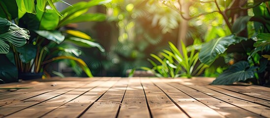 Aufkleber - A summer resort themed composition with a brown wooden floor and vibrant green leaves in the foreground offering ample copy space image
