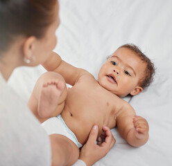 Wall Mural - Mother, baby and bonding in home, tickle and love for infant or support in child development. Mommy, playing and boy for affection or care in bedroom, security and connect in relationship or comfort