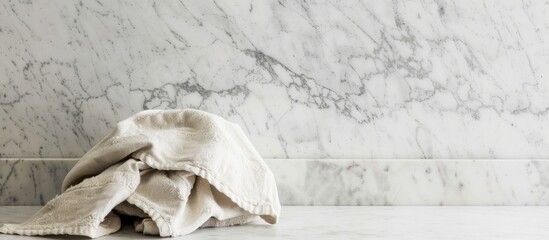 Aufkleber - White marble table displaying a kitchen towel with ample copy space image