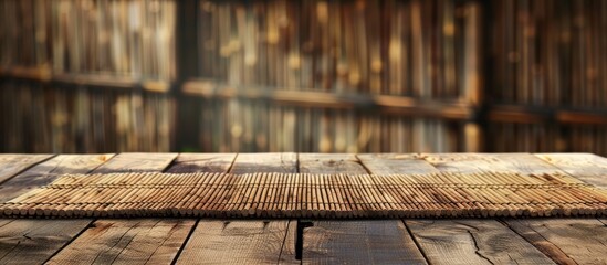 Poster - Wooden deck table with bamboo place mat featuring copy space image