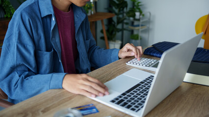 Wall Mural - Business man accountant financial analyst and auditor working and laptop for calculating 