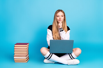 Sticker - Photo of intelligent lovely adorable girl wear trendy clothes pile stack book isolated on blue color background